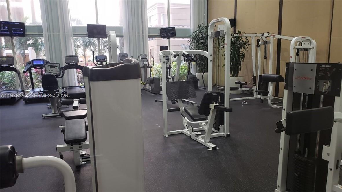 17150 North Bay Road, Unit 2406 Sunny Isles Beach, FL 33160 - Photo 20 of 22 a view of a room with gym equipment