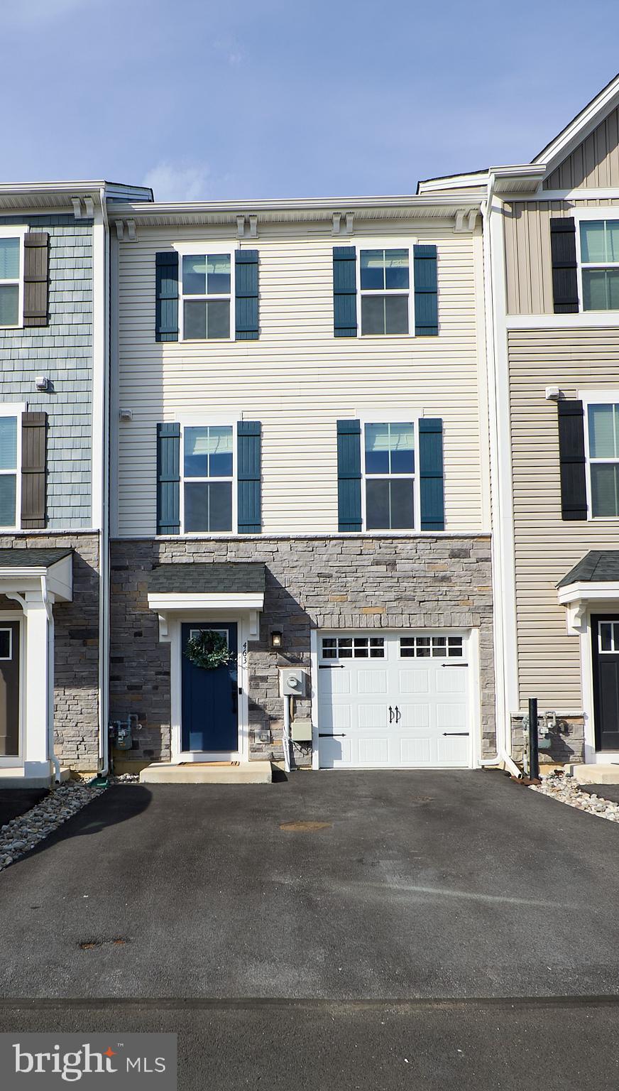 463 Paperbark Square Downingtown, PA 19335 - Photo 1 of 31 a front view of a building with a road