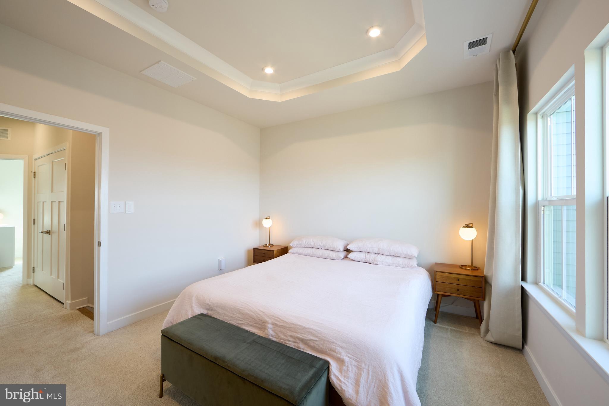 463 Paperbark Square Downingtown, PA 19335 - Photo 15 of 31 a bedroom with a bed and a window