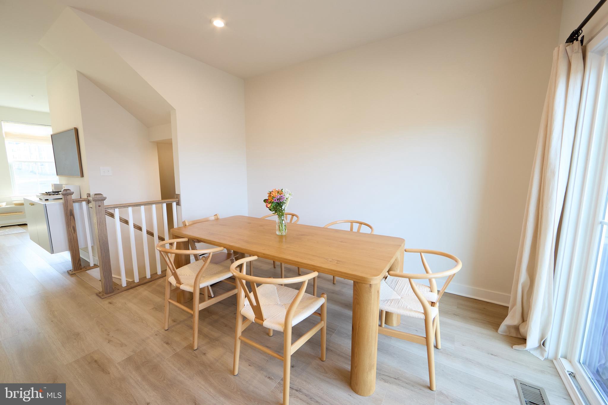 463 Paperbark Square Downingtown, PA 19335 - Photo 8 of 31 a view of a dining room with furniture and wooden floor