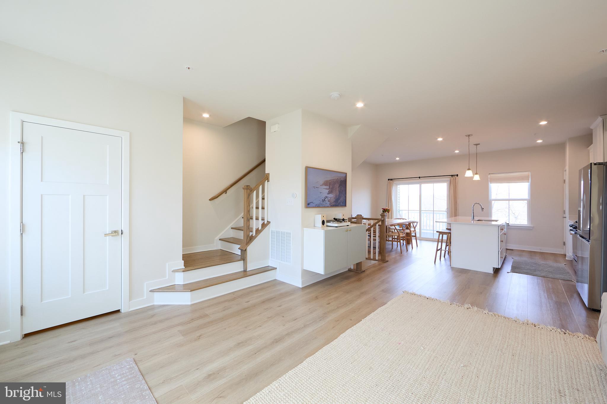 463 Paperbark Square Downingtown, PA 19335 - Photo 10 of 31 a living room with furniture wooden floor and a large window