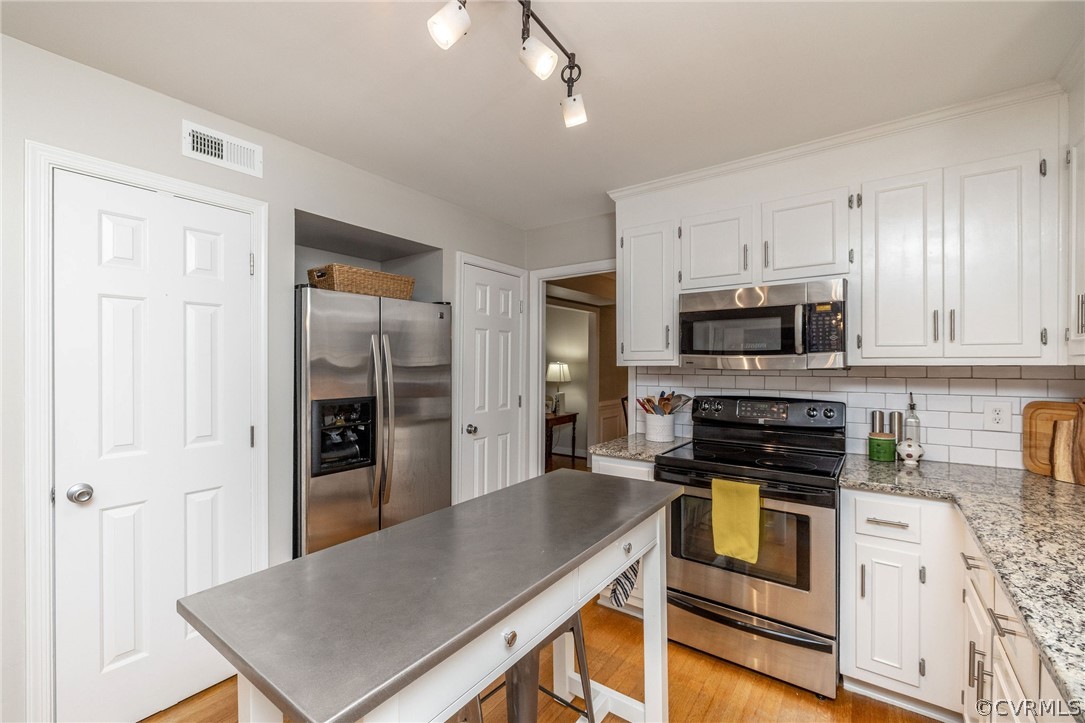 2303 Shadow Ridge Court Midlothian, VA 23112 - Photo 12 of 46 Stainless Steel Appliances convey