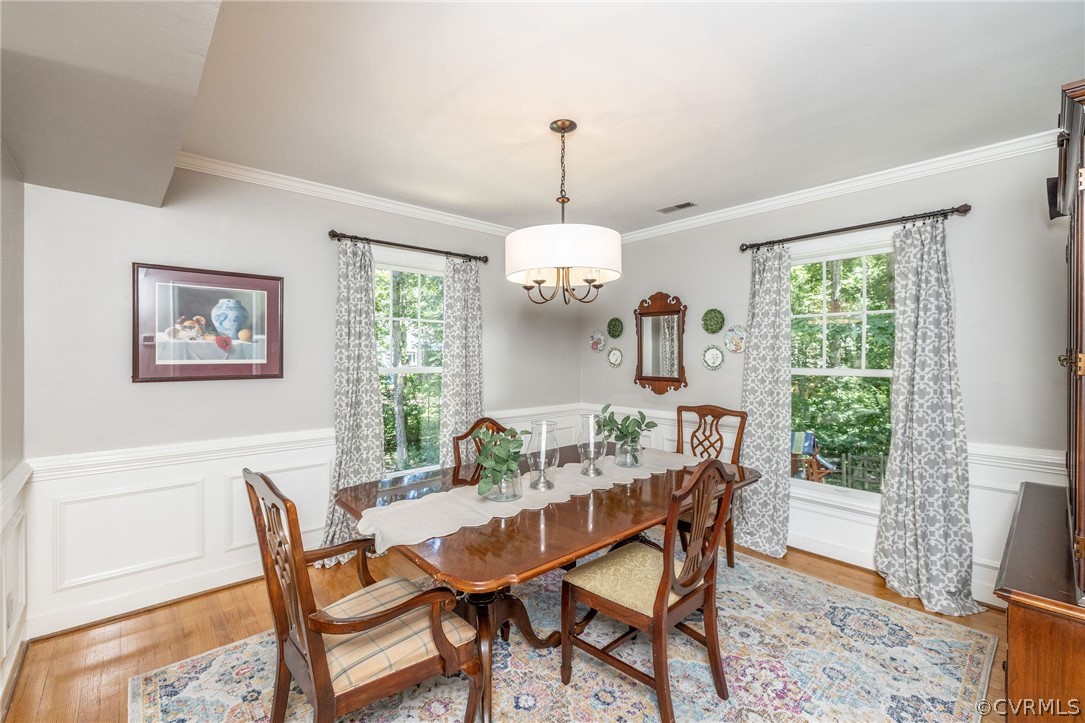 2303 Shadow Ridge Court Midlothian, VA 23112 - Photo 8 of 46 Formal Dining Room w Waynescotting, Crown & Chair