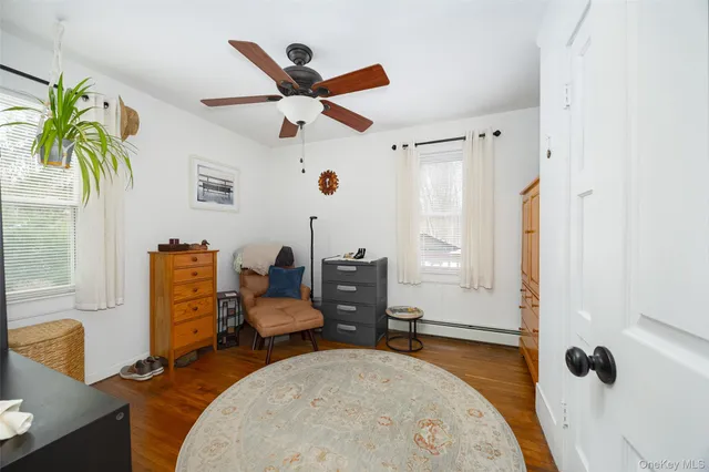 a bedroom with bed and window