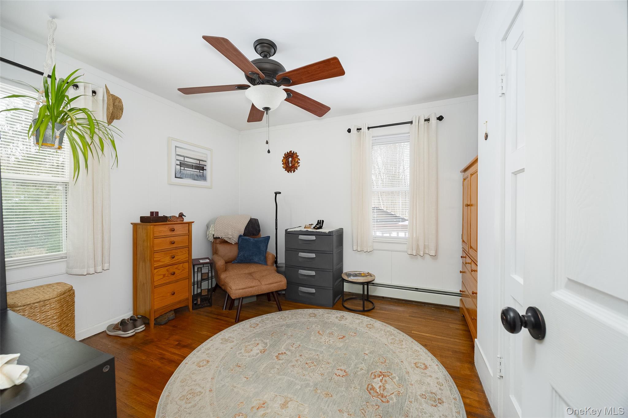28 Red Oaks Mill Road Poughkeepsie, NY 12603 - Photo 13 of 21 a bedroom with a bed and wooden floor