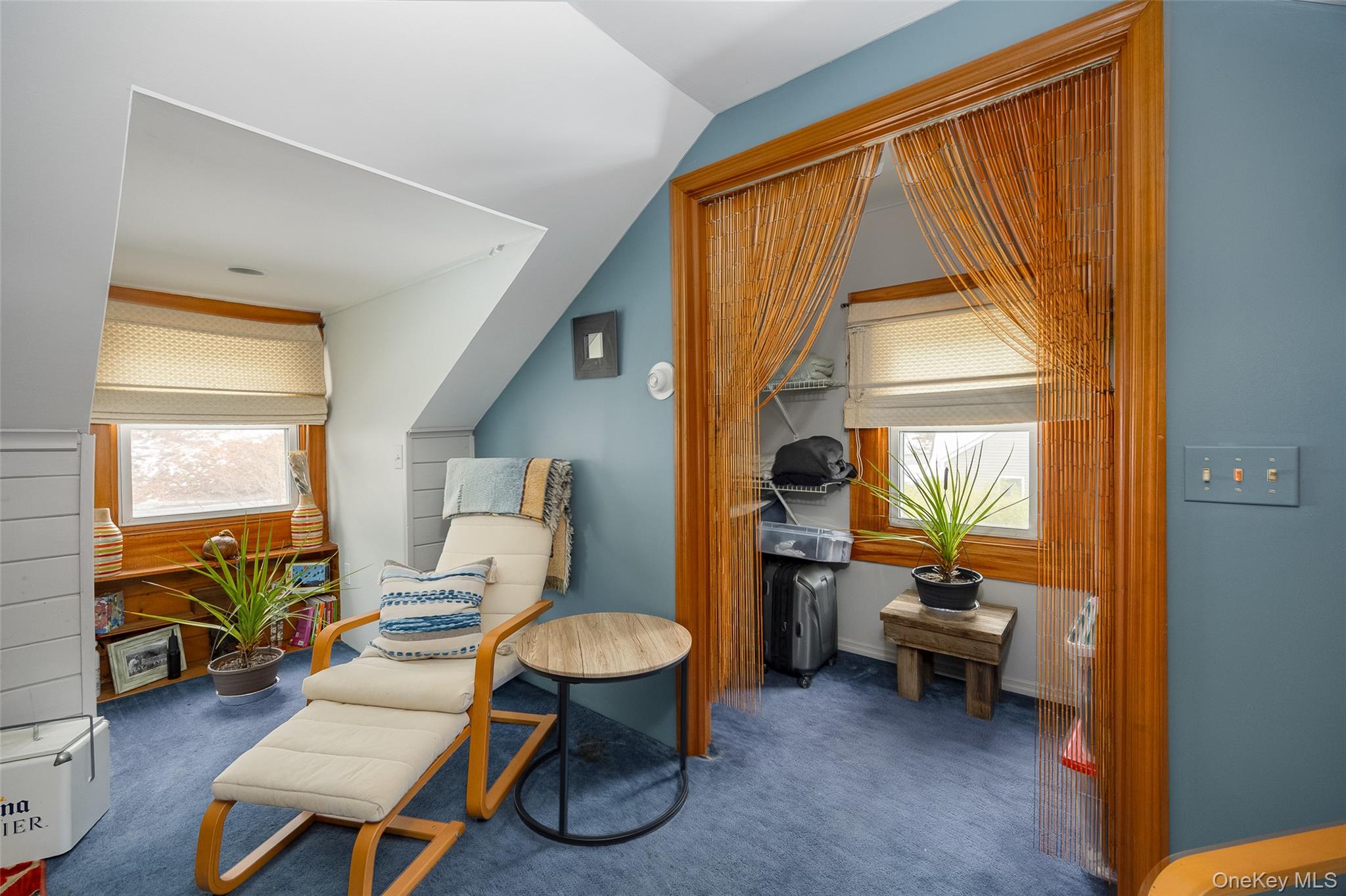 28 Red Oaks Mill Road Poughkeepsie, NY 12603 - Photo 16 of 21 a living room with furniture a fireplace and a floor to ceiling window
