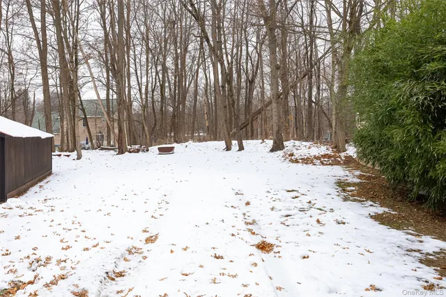 a view of a two chairs on the roof deck