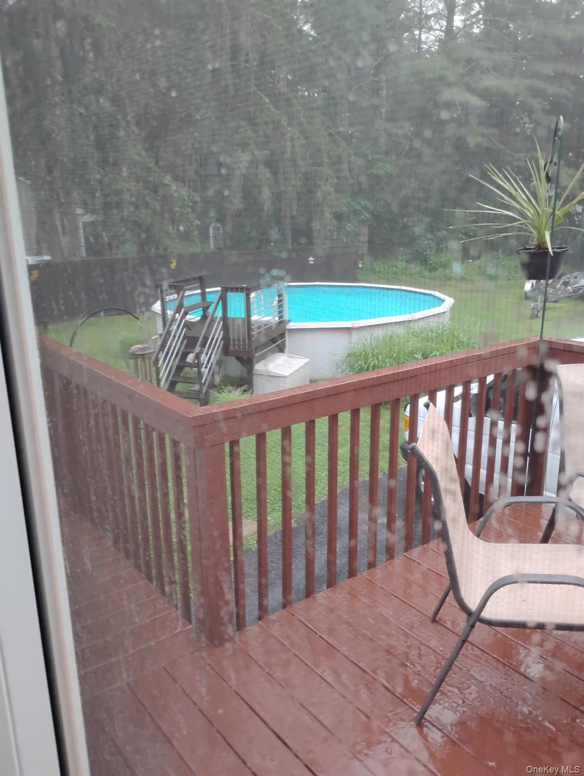 28 Red Oaks Mill Road Poughkeepsie, NY 12603 - Photo 21 of 21 a view of a two chairs on the roof deck