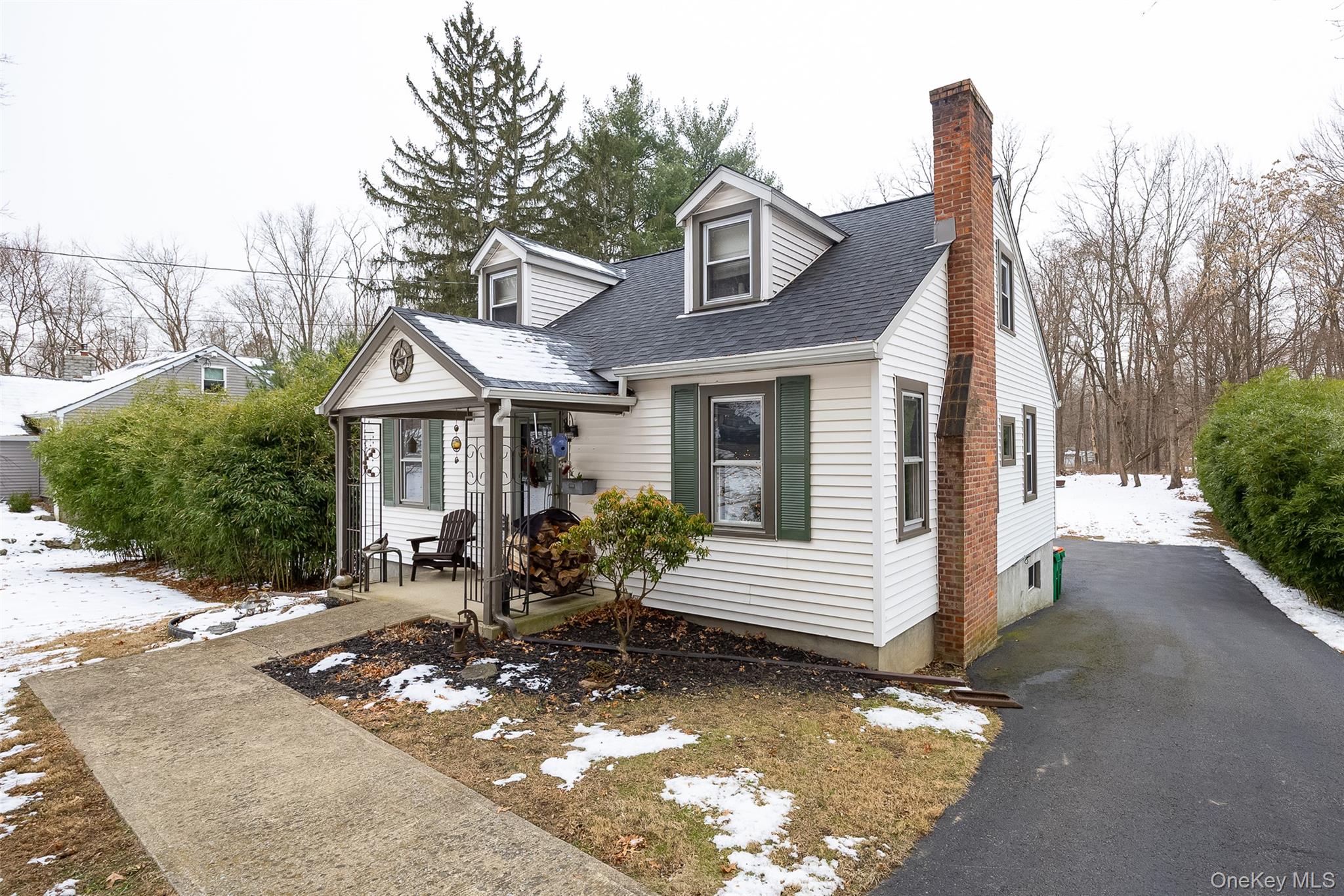 28 Red Oaks Mill Road Poughkeepsie, NY 12603 - Photo 3 of 21 a front view of house with yard outdoor seating and barbeque oven