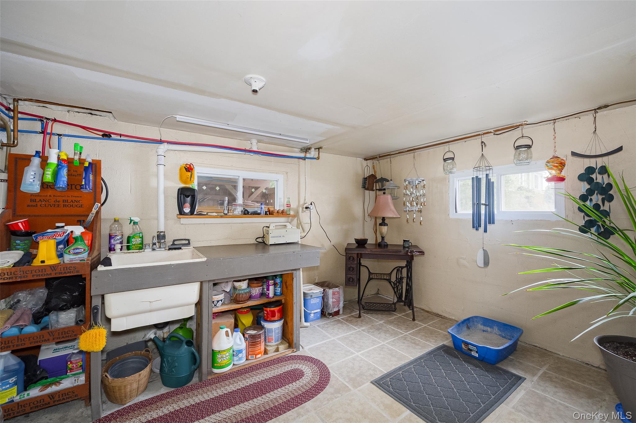 28 Red Oaks Mill Road Poughkeepsie, NY 12603 - Photo 10 of 21 a living room with furniture and a book shelf