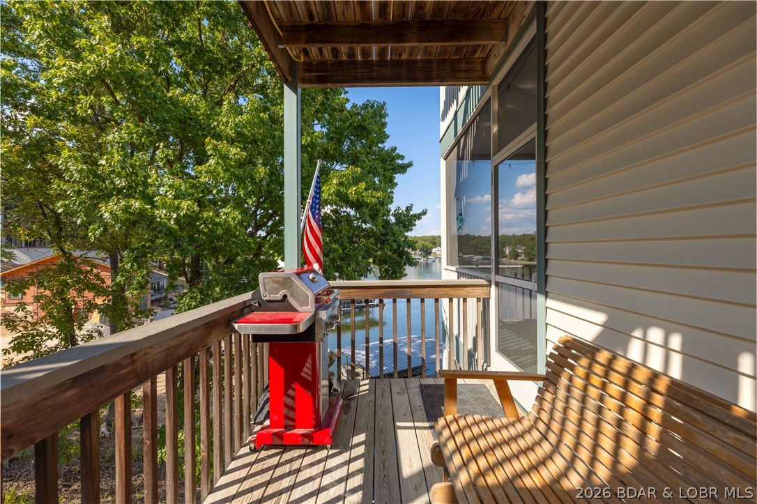 73 Evergreen Road, Unit 3A Sunrise Beach, MO 65079 - Photo 15 of 89 This open side deck is ideal for grilling and rela
