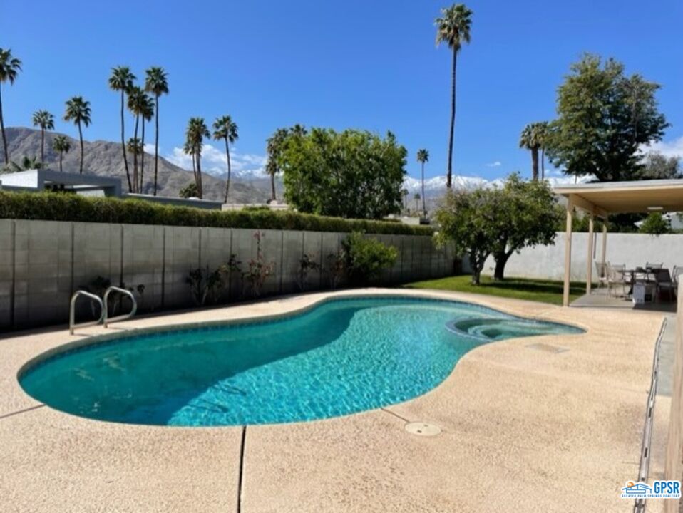 70161 Chappel Road Rancho Mirage, CA 92270 - Photo 19 of 20 a view of a swimming pool with a yard