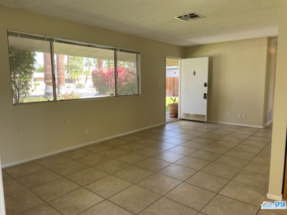 70161 Chappel Road Rancho Mirage, CA 92270 - Photo 4 of 20 a view of an empty room and window