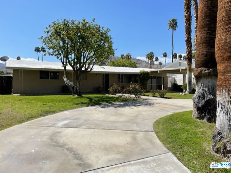 70161 Chappel Road Rancho Mirage, CA 92270 - Photo 8 of 20 a front view of a house with a yard