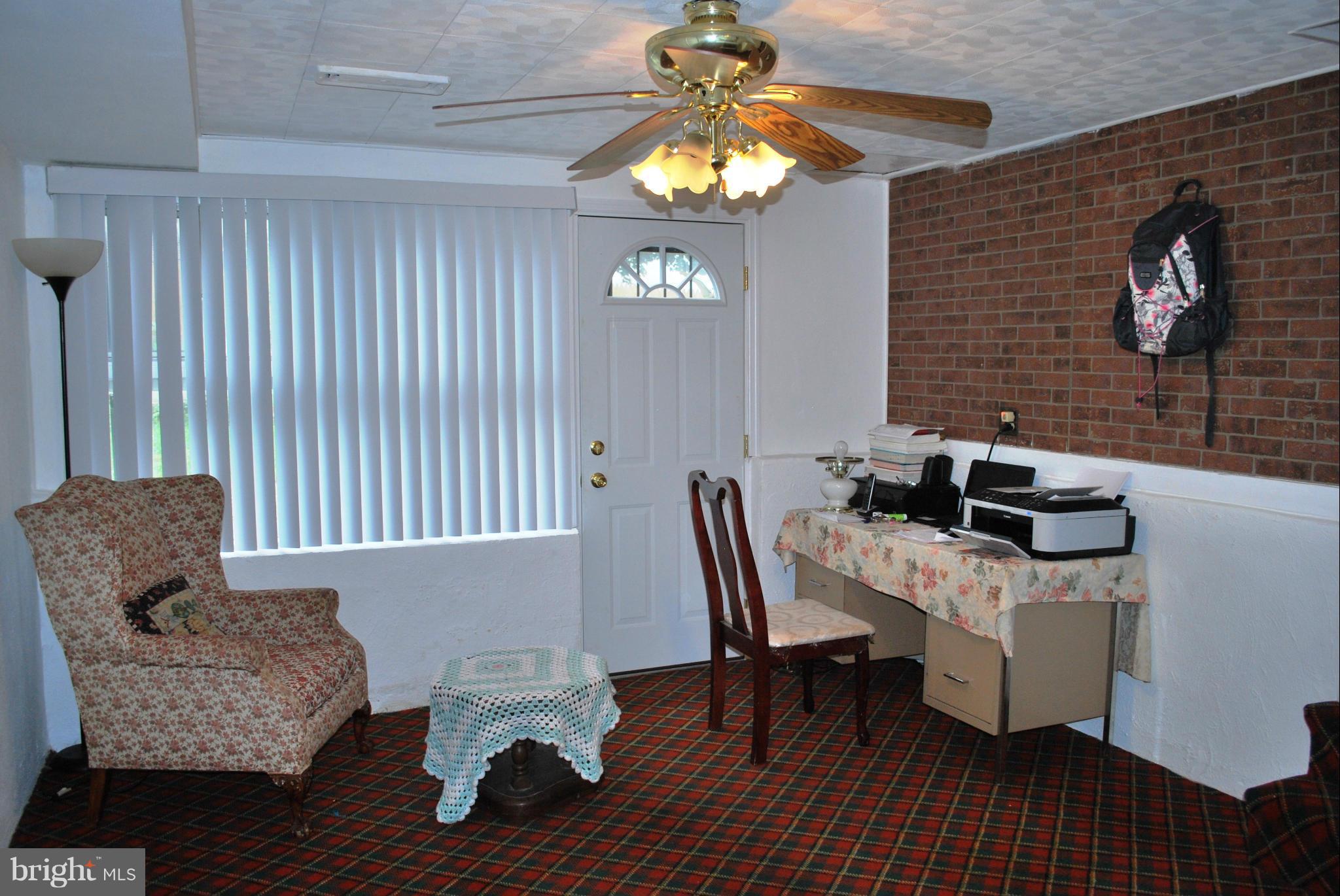 1001 Hallimont Road Catonsville, MD 21228 - Photo 13 of 19 a work room with furniture and a window