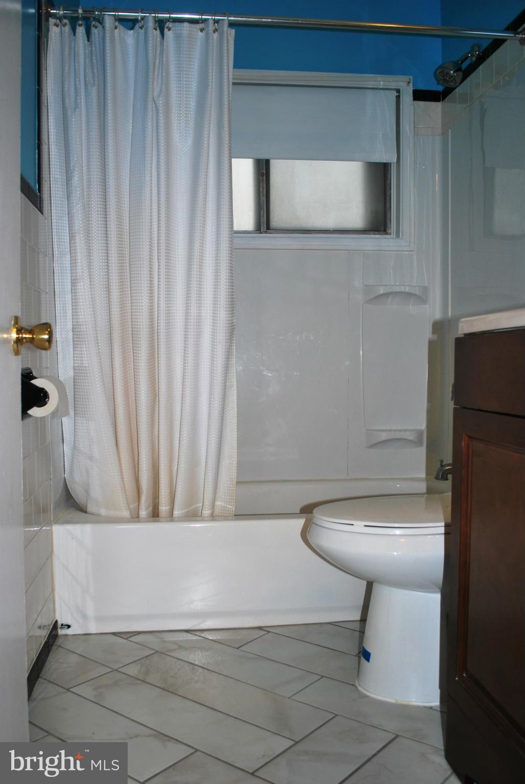 1001 Hallimont Road Catonsville, MD 21228 - Photo 19 of 19 a bathroom with a sink and a toilet