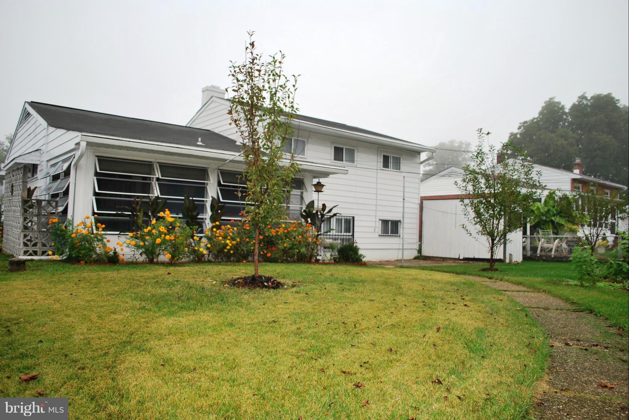 1001 Hallimont Road Catonsville, MD 21228 - Photo 6 of 19 a view of a house with patio