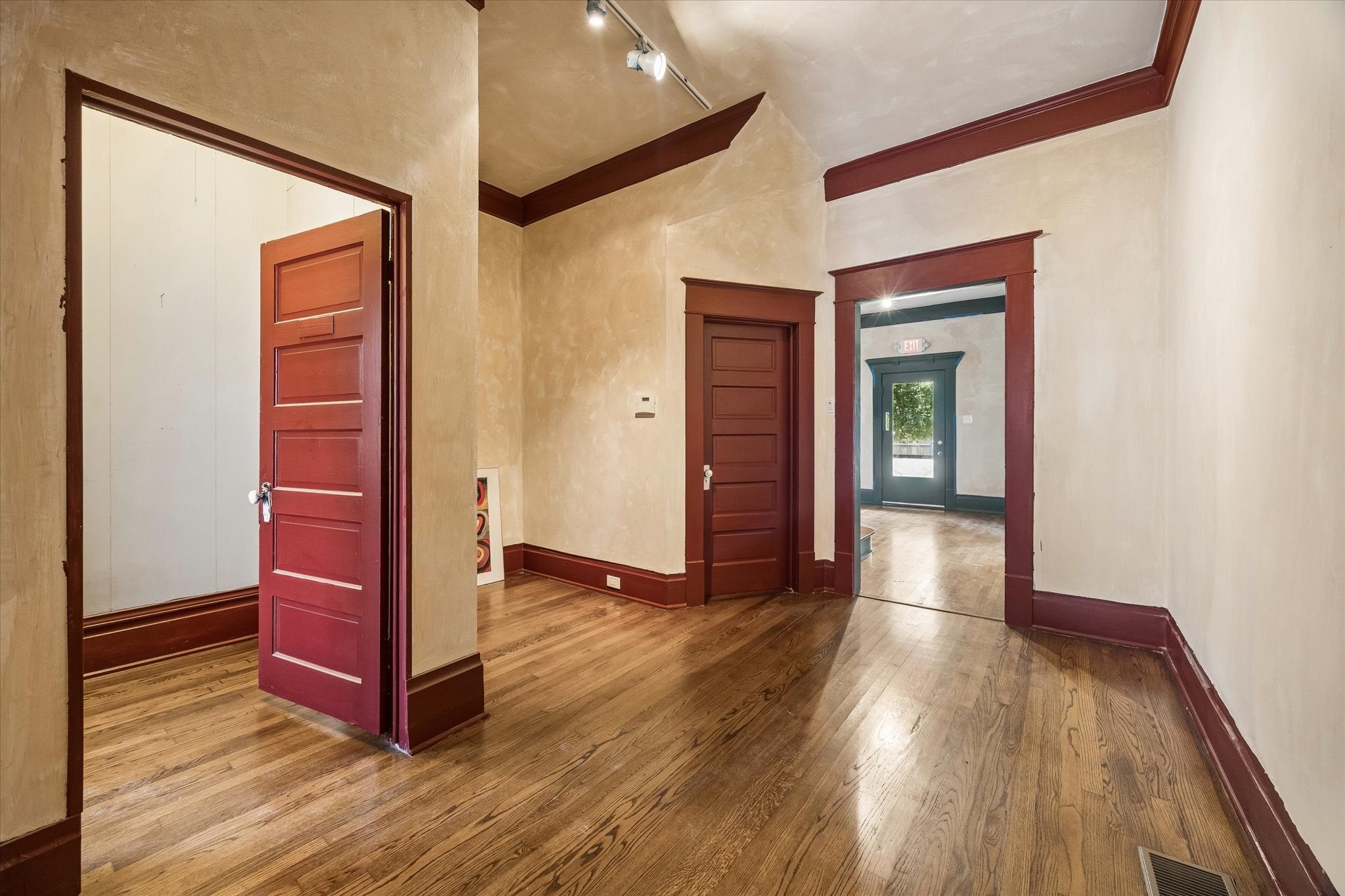 239 Westheimer Road Houston, TX 77006 - Photo 13 of 42 MAIN HOUSE - expansive hallway with large storage closet off and half bathroom on first floor