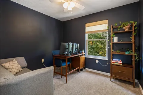 a room with furniture and a window