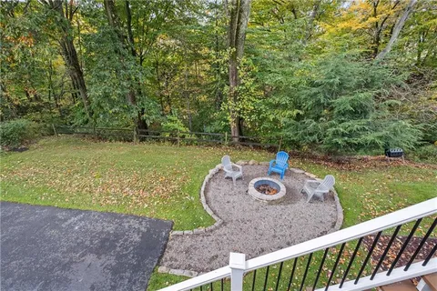 a view of a backyard with outdoor space