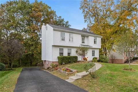a picture of a book and a bed