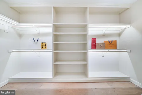 a view of an empty walk in closet