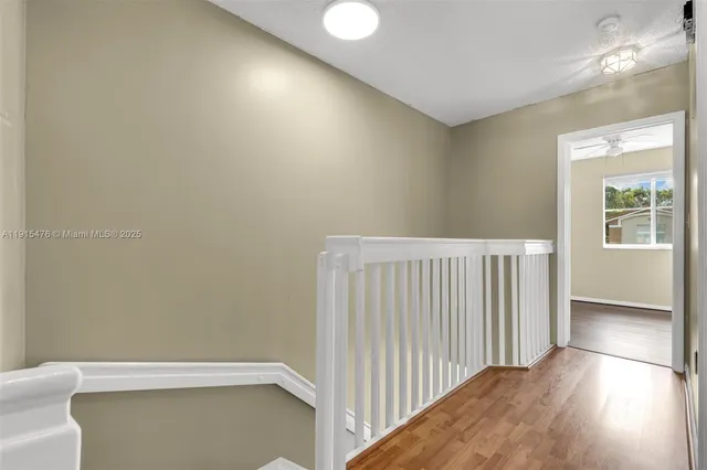 a view of a hallway with entryway