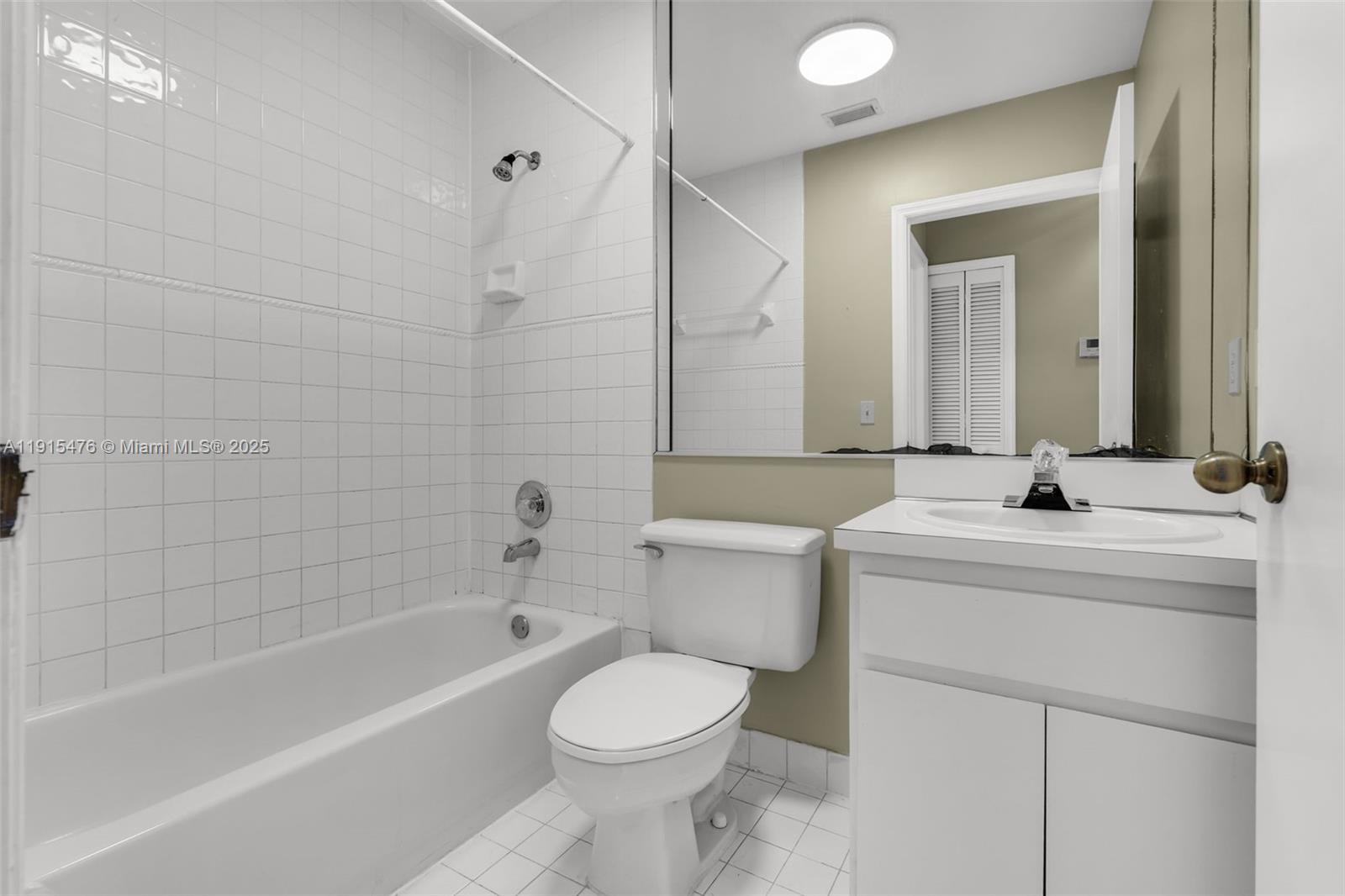 6263 Southwest 139th Avenue Miami, FL 33183 - Photo 20 of 38 a bathroom with a sink toilet and shower