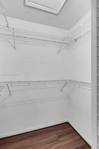 a view of a room with racks on the wall