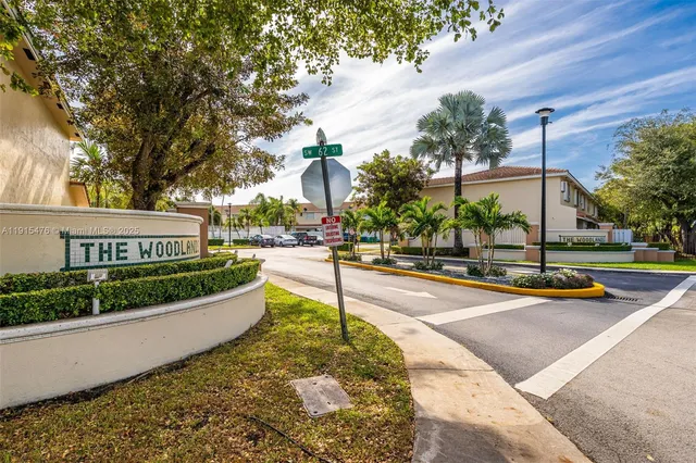 a view of a swimming pool with a bench and bench