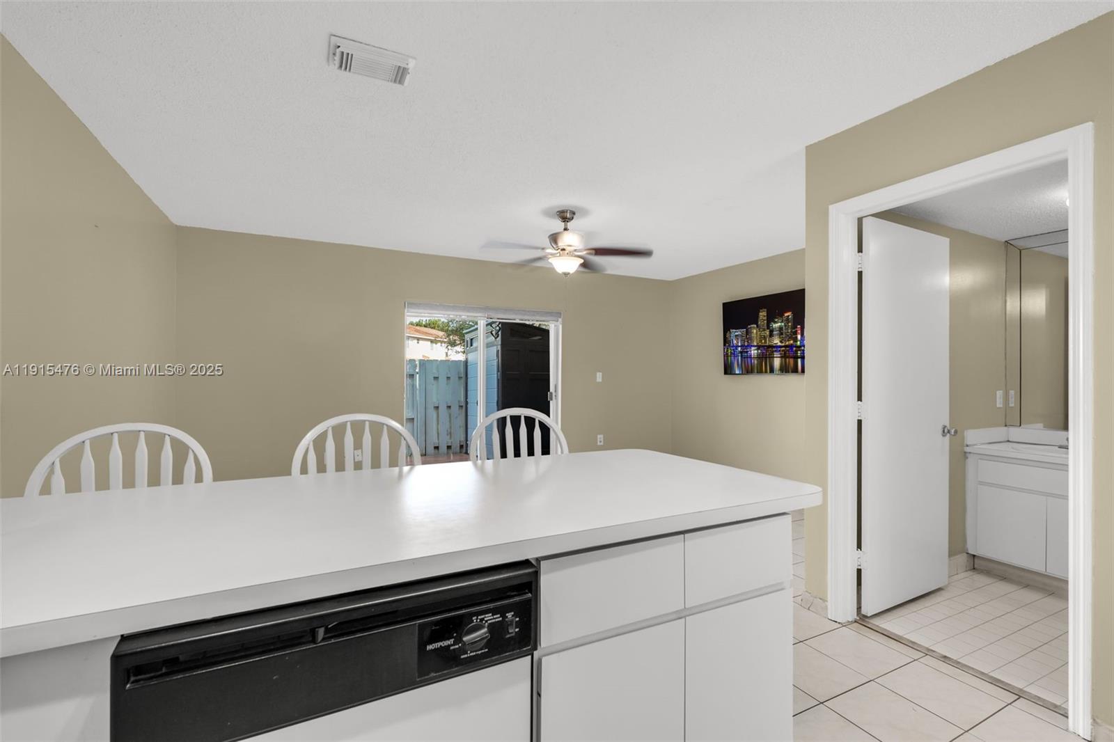 6263 Southwest 139th Avenue Miami, FL 33183 - Photo 10 of 38 a view of a kitchen from the hallway