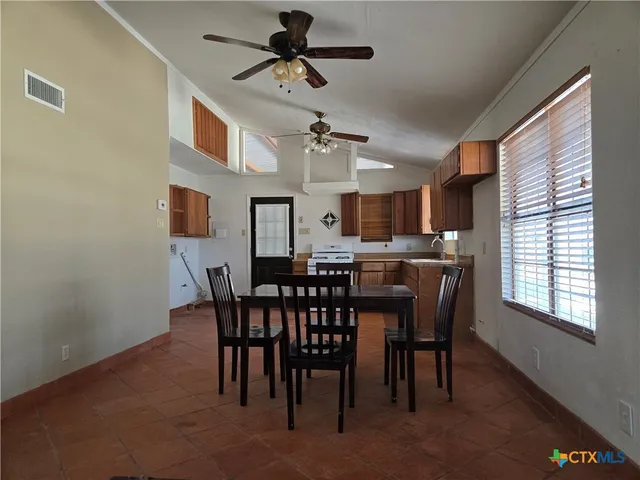 a view of a dining room with furniture