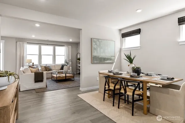 a view of a livingroom with furniture and window