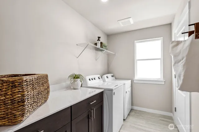 a bathroom with a sink and a window