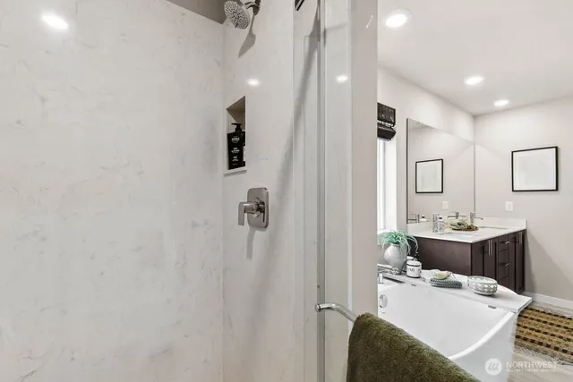 a room with furniture and mirror