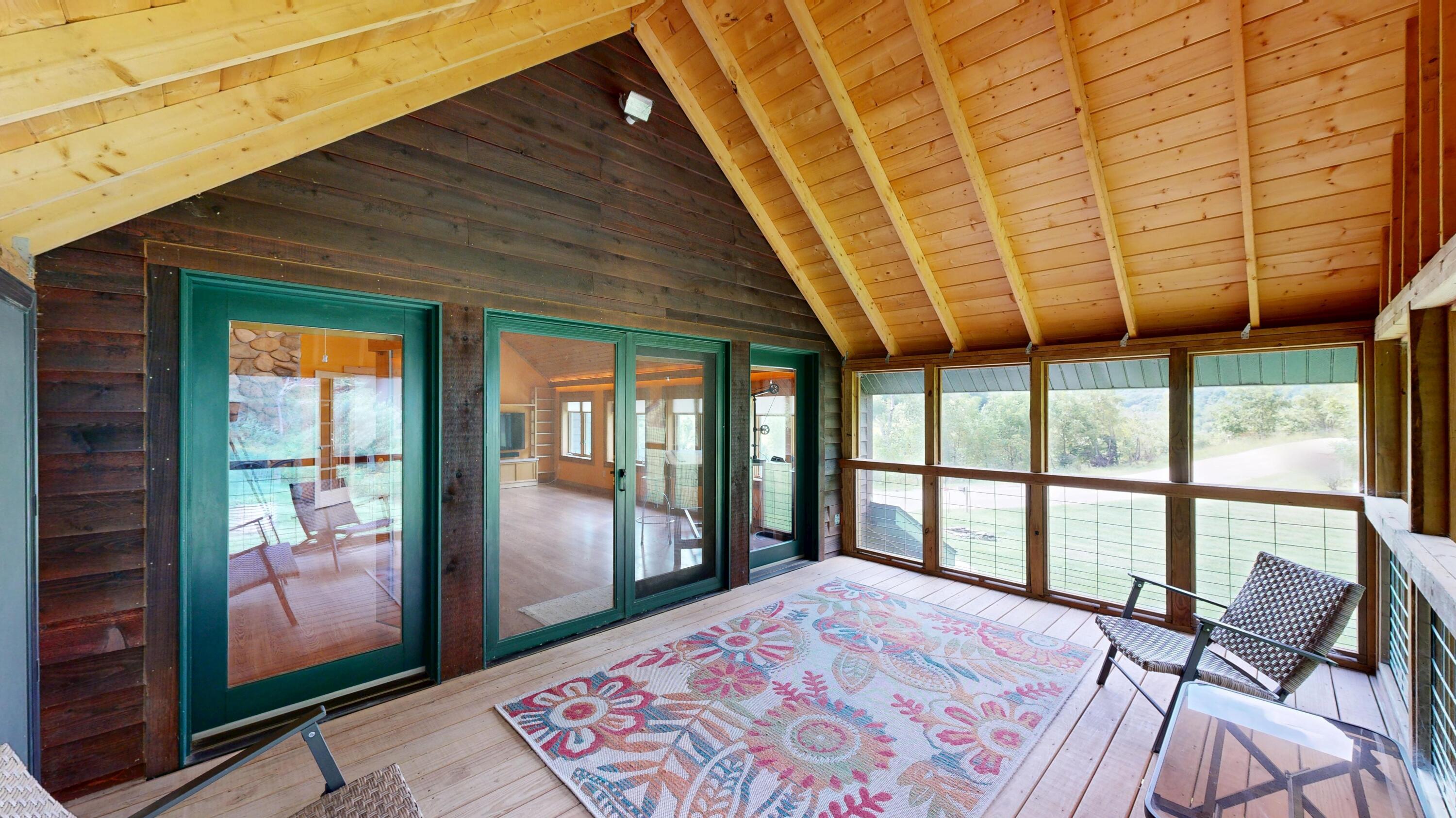 E10550 South Elk Run Road Webster, WI 54664 - Photo 6 of 59 Screened porch