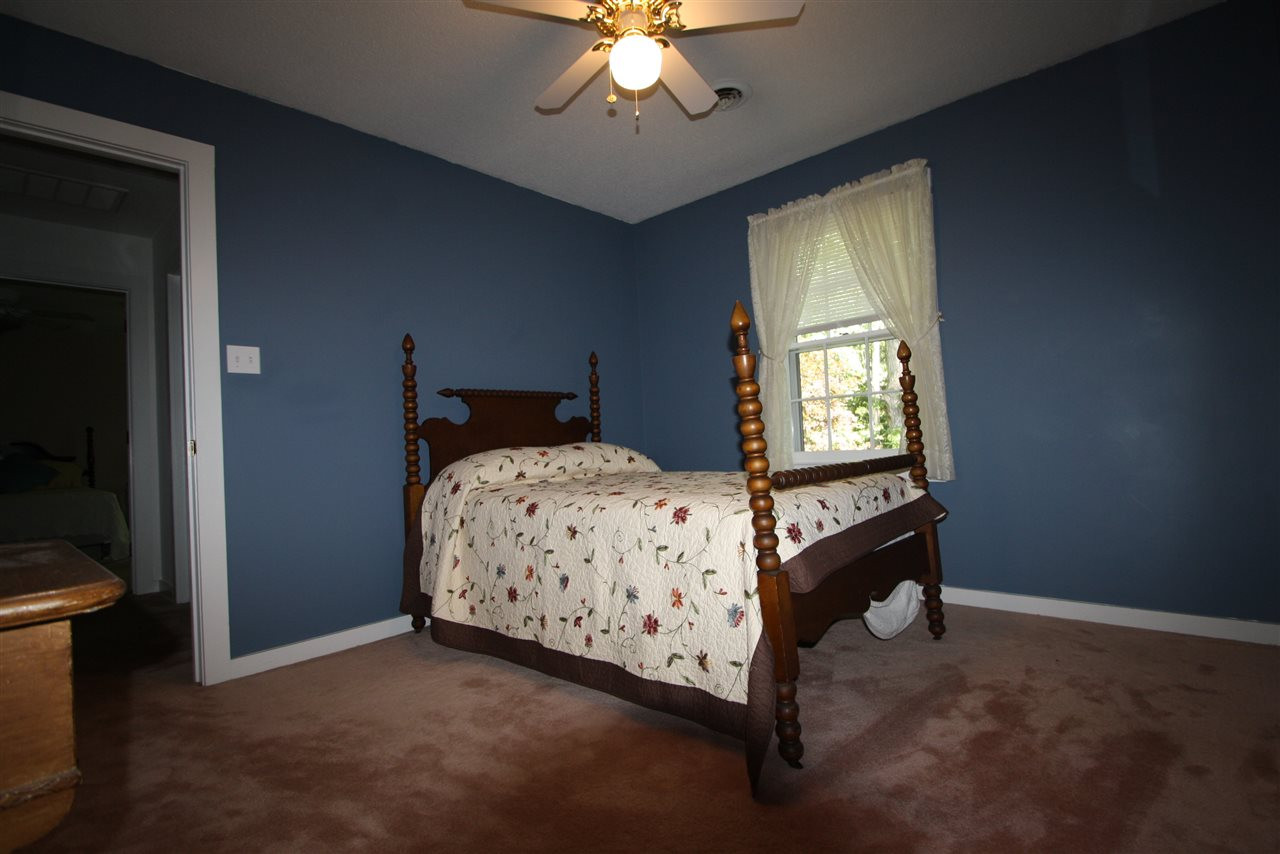 8624 Langtree Lane Raleigh, NC 27613 - Photo 14 of 25 Secondary Bedroom