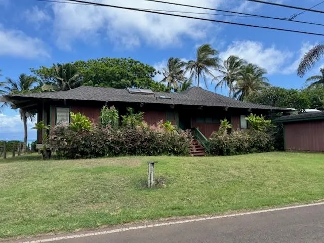 a view of a house with a garden