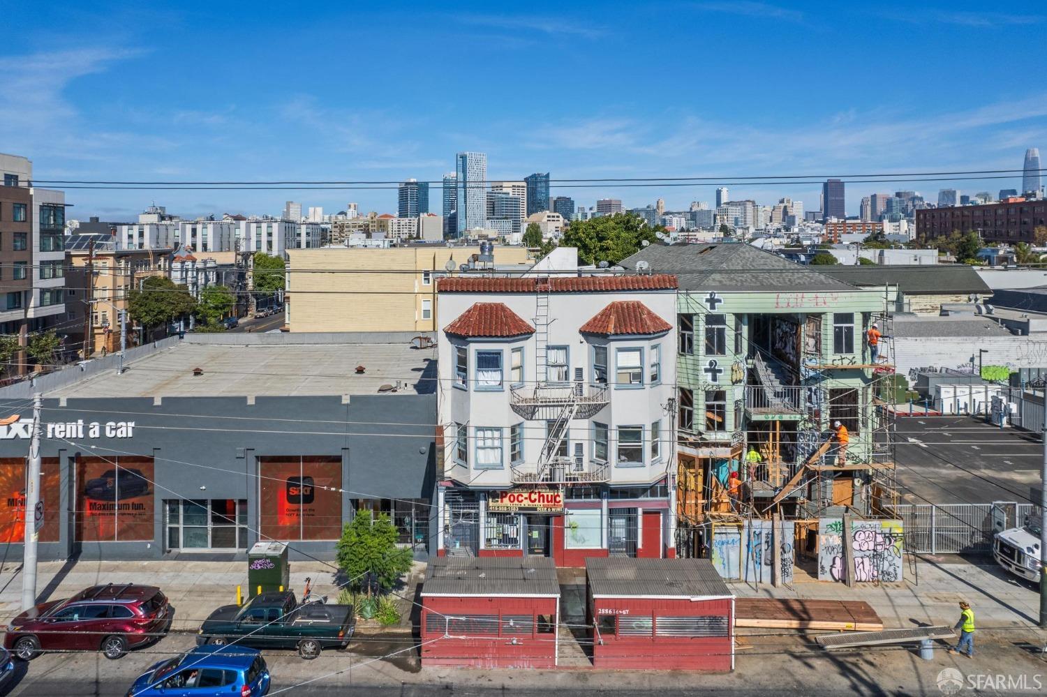 2886 16th Street San Francisco, CA 94103 - Photo 1 of 19 a front view of a building with outdoor seating