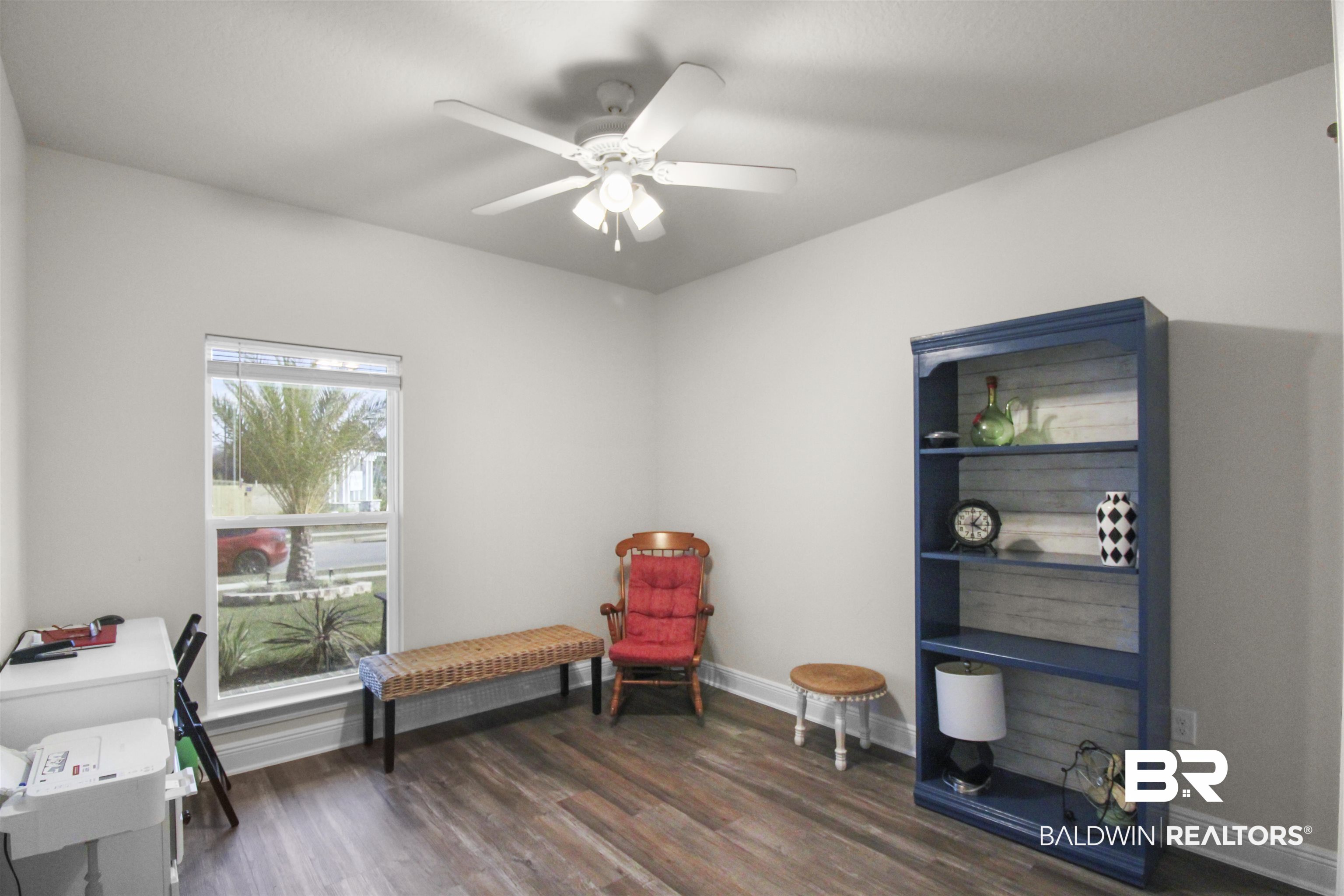 12523 Pheasant Run Elberta, AL 36530 - Photo 28 of 43 Living area with dark wood-type flooring and a ceiling fan