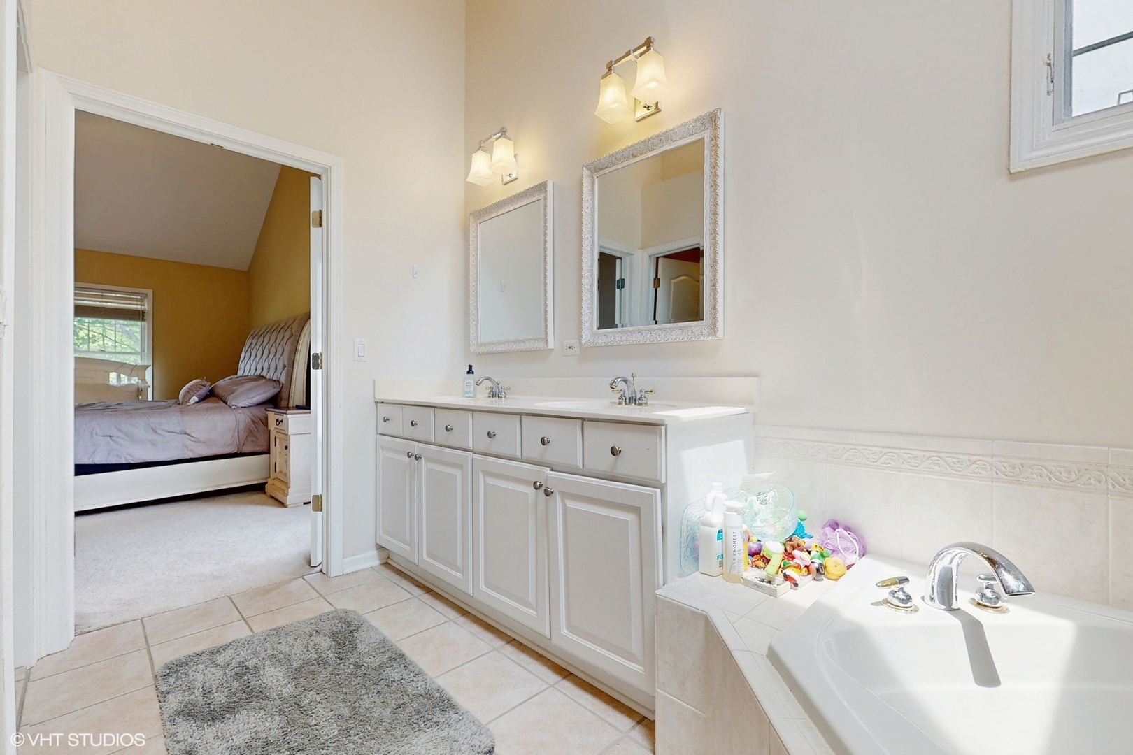 3432 Redwing Drive Naperville, IL 60564 - Photo 25 of 46 a bathroom with a sink vanity and mirror