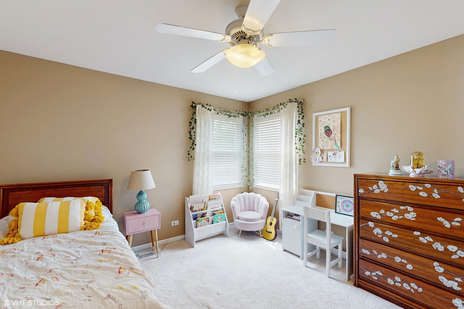 3432 Redwing Drive Naperville, IL 60564 - Photo 28 of 46 a bedroom with a bed and a chandelier