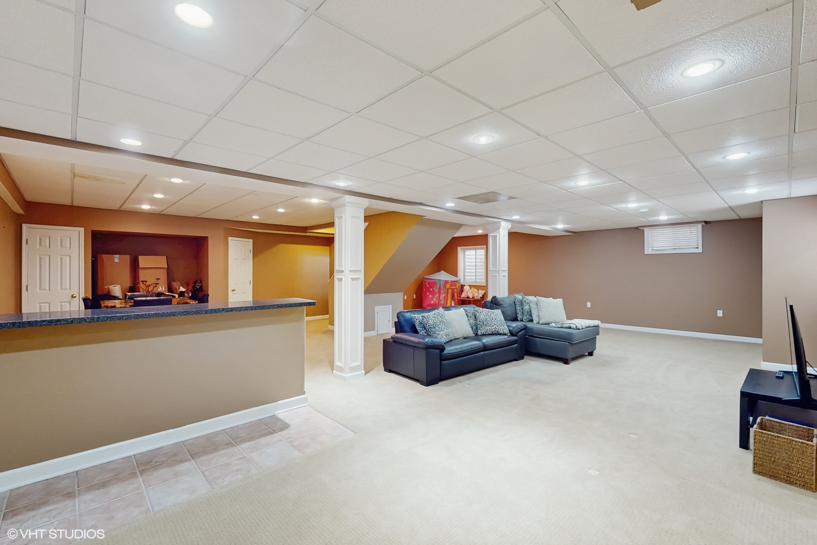 3432 Redwing Drive Naperville, IL 60564 - Photo 34 of 46 a living room with furniture and a flat screen tv