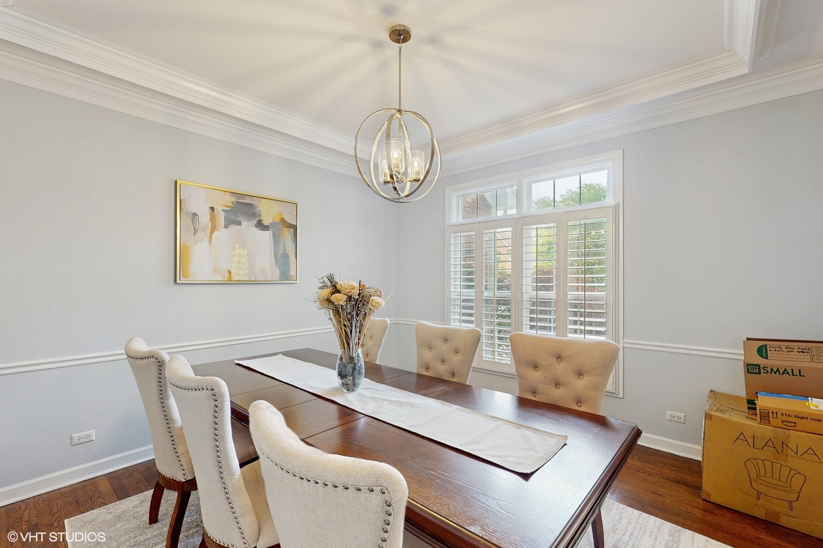 3432 Redwing Drive Naperville, IL 60564 - Photo 7 of 46 a dining room with furniture a chandelier and wooden floor