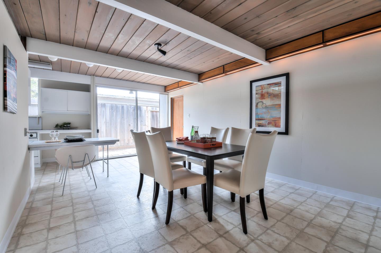 834 Constitution Drive Foster City, CA 94404 - Photo 16 of 34 a view of a dining room with furniture