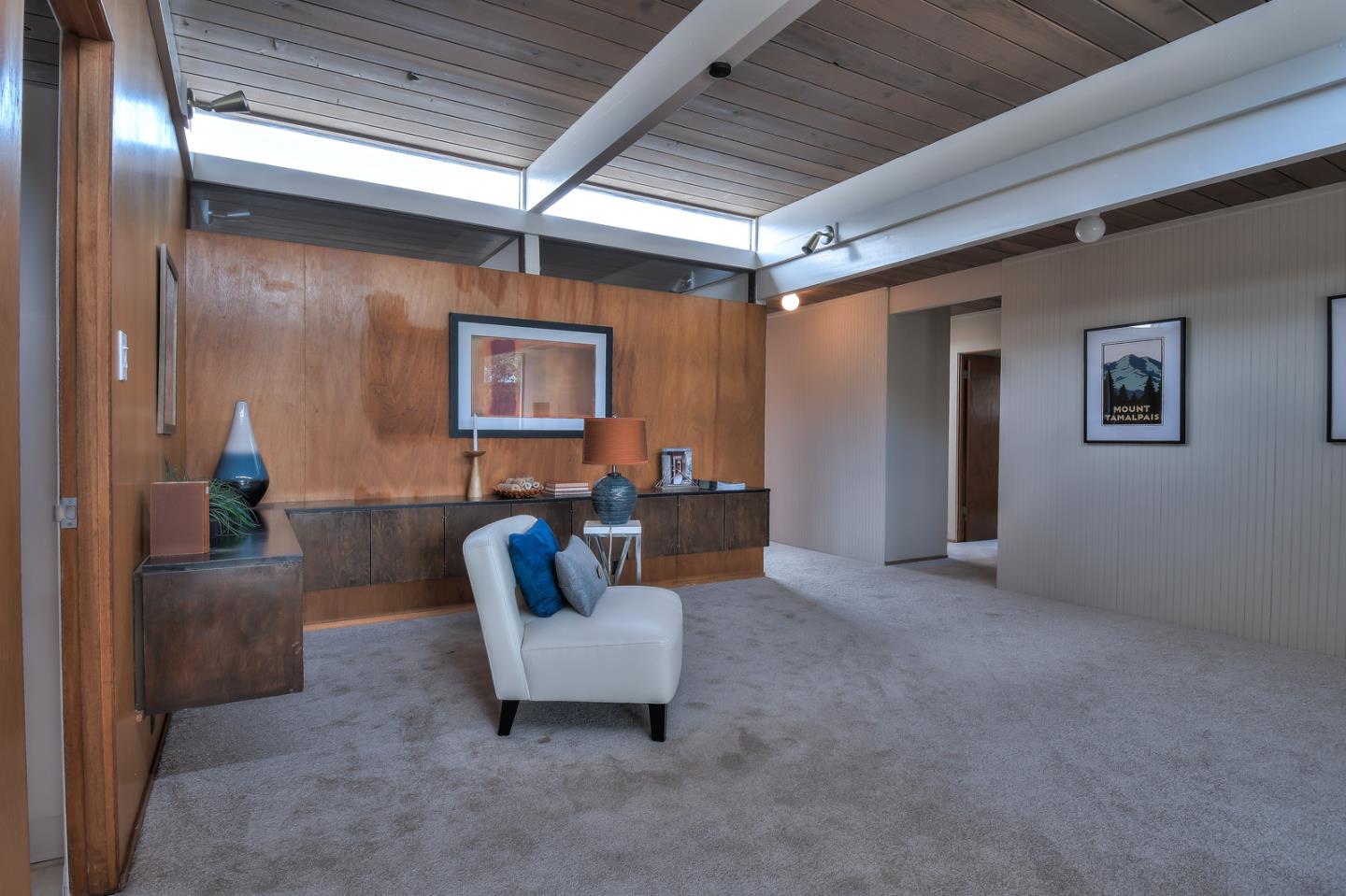 834 Constitution Drive Foster City, CA 94404 - Photo 20 of 34 a living room with furniture and a chandelier