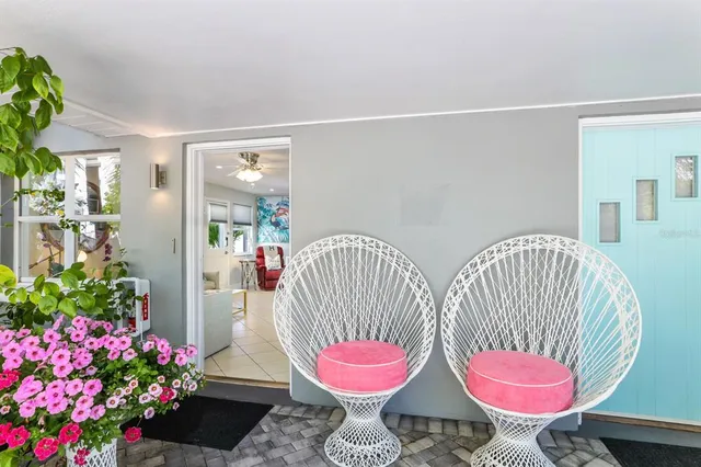 a bedroom with a bed and a large mirror