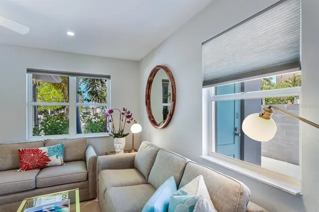 a large kitchen with kitchen island a sink stainless steel appliances and cabinets