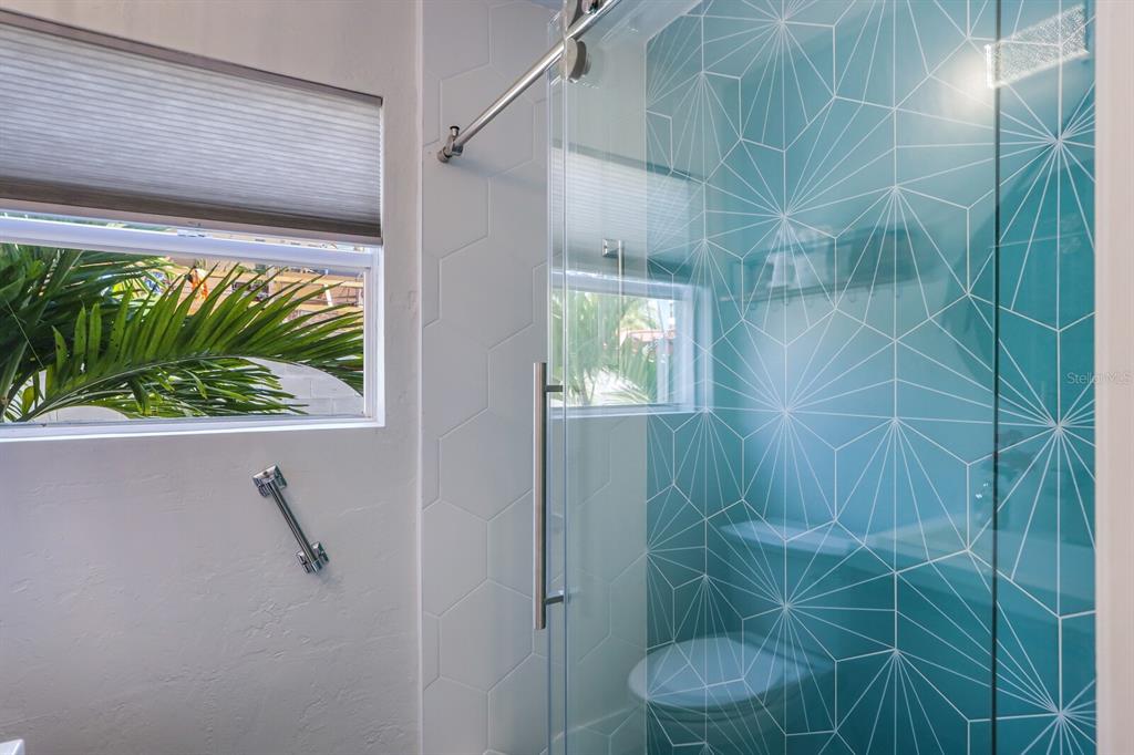 161 Golden Gate Point, Unit 1 Sarasota, FL 34236 - Photo 23 of 79 a bathroom with a toilet and a shower