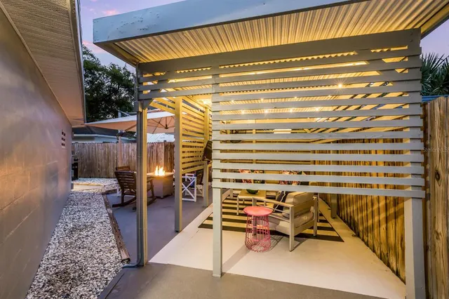 a view of a swimming pool with a patio